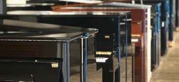 Affordable new and pre-owned acoustic pianos in The Music Station showroom
